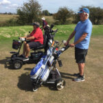 Tony Wisdom and Derek Greenwood follow a good second shot by Derreck Stevens on the 13th